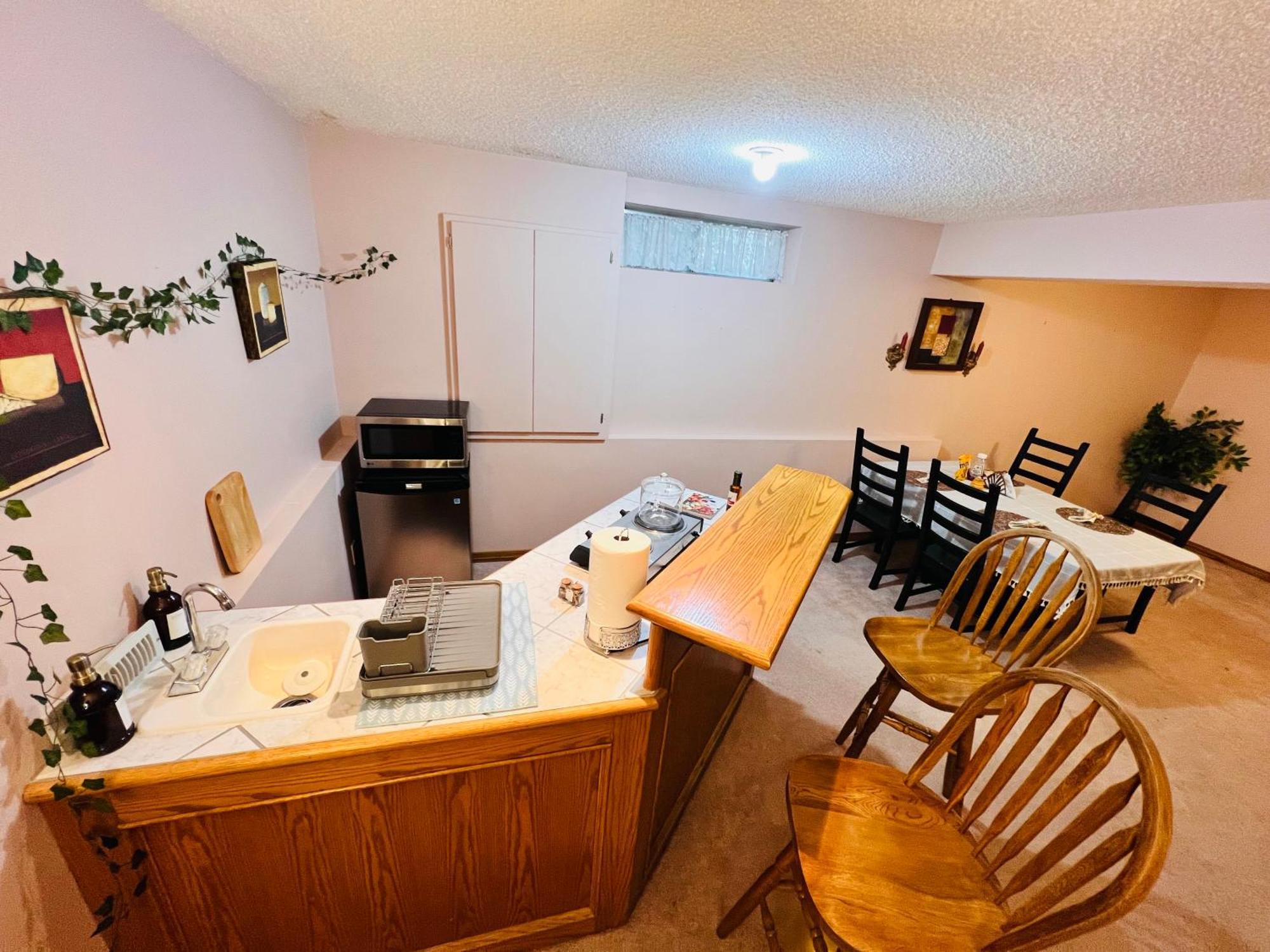 A Classic Homely Basement Suite! Chestermere Экстерьер фото